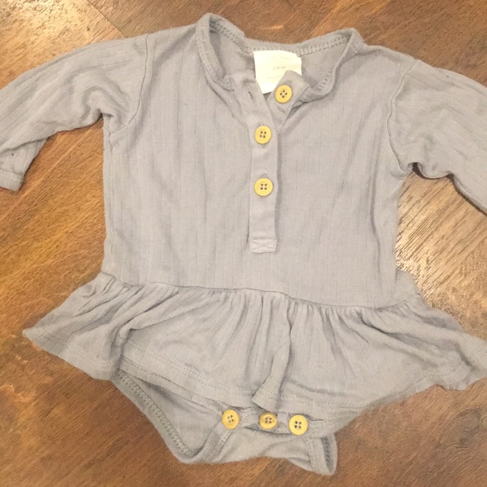 Kate Quinn ruffle skirt onesie